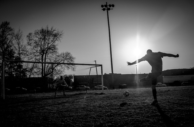 Frank Del Valle Coss, 437th Aircraft Maintenance Squadron intramural soccer team forward, takes the first shot of the shoot out against the 437th Aerial Port Squadron intramural soccer team March 14, 2013, at the Joint Base Charleston – Air Base soccer fields. The 437th AMXS soccer team squeaked by the 437th APS soccer team in a 4 – 2 shootout win in Joint Base Charleston’s 2013 intramural soccer season opener. (U.S. Air Force photo/ Senior Airman Dennis Sloan)