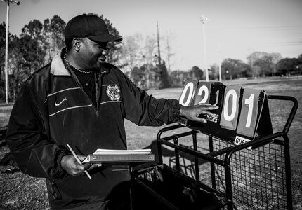 Julius Murray, intramural soccer referee, changes the score on the side line board after the 437th Aircraft Maintenance Squadron intramural soccer team scored their second goal of the game against the 437th Aerial Port Squadron intramural soccer team March 14, 2013, at the Joint Base Charleston – Air Base soccer fields. The 437th AMXS soccer team squeaked by the 437th APS soccer team in a 4 – 2 shootout win in Joint Base Charleston’s 2013 Intramural Soccer Season opener. (U.S. Air Force photo/ Senior Airman Dennis Sloan)