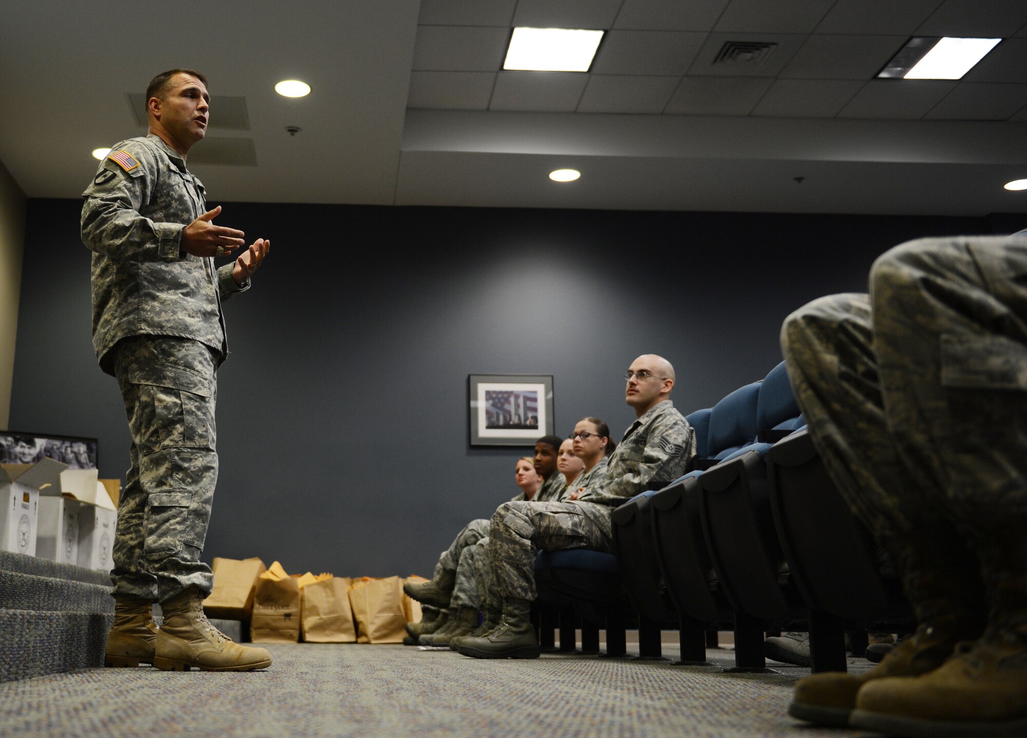 U.S. Army Col. Timothy Bosetti, Army Central surgeon executive officer, speaks to squadron and unit representatives at the deployment processing center, Shaw Air Force Base, S.C., March 18, 2013. The C.W. Bill Young Department of Defense marrow donor program officially kicked off at the DPC and will continue throughout the week at different locations. (U.S. Air Force photo by Senior Airman Tabatha Zarrella/Released)
