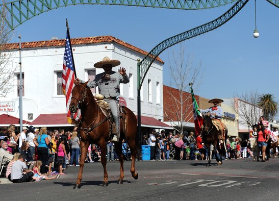 Horse riders march in the Bok Kai Festival in Marysville, Calif., March 16, 2013. The festival celebrates Bok Kai, the Chinese god of the North. (U.S. Air Force photo by Staff Sgt. Robert M. Trujillo/Released)