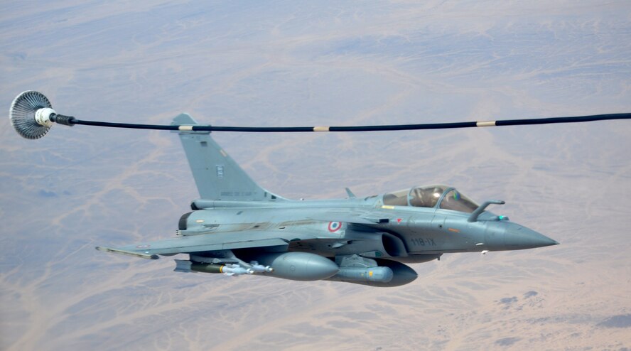 A French fighter aircraft pulls forward after refueling from a KC-135 Stratotanker flown by the 351st Expeditionary Air Refueling Squadron during a March 17, 2013, mission. (U.S. Air Force photo by Capt. Jason Smith)