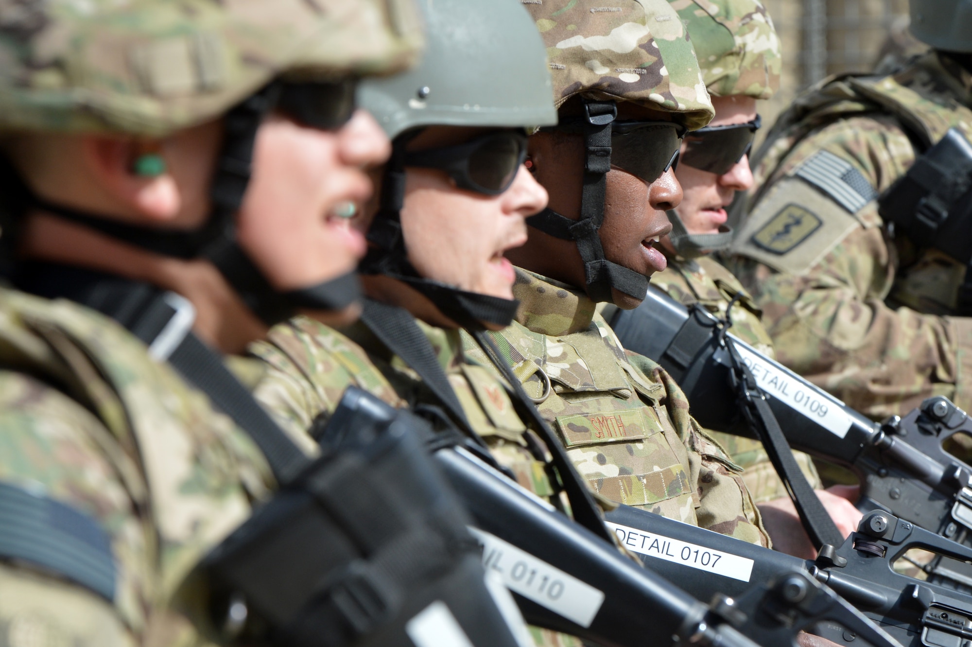 Airmen repeat the command “active shooter” during a training scenario on Bagram Airfield, Afghanistan, March 7, 2013. Members of the 455th Expeditionary Security Forces Group Combat Arms Training and Maintenance train deployed Airmen on the needed skills to react to a possible active shooter on the base. (U.S. Air Force photo/Senior Airman Chris Willis)