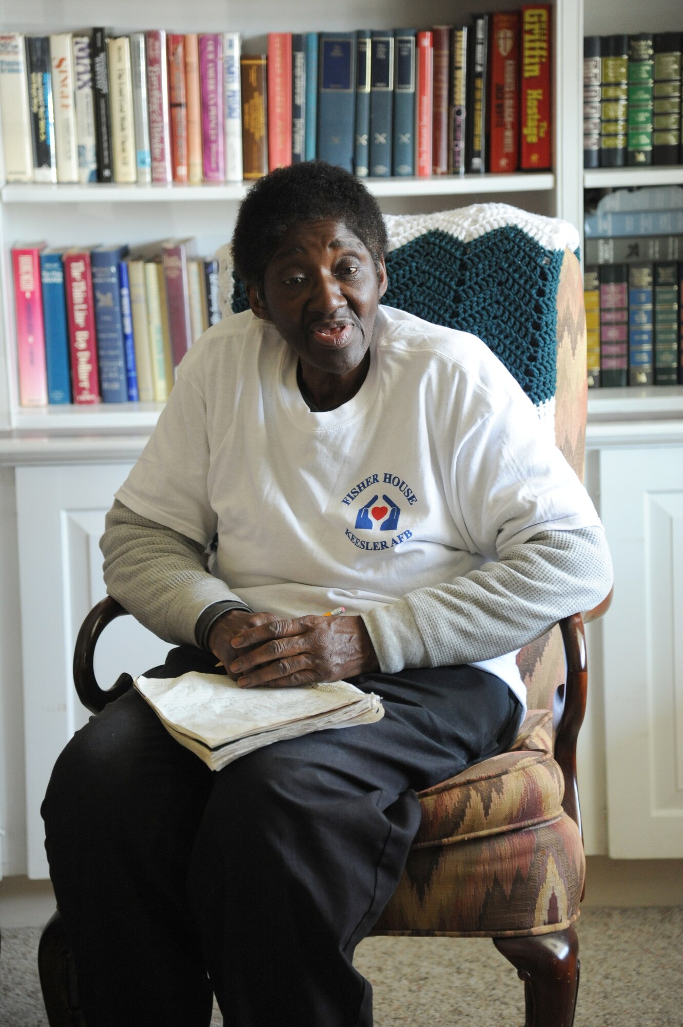 Mary Burley, housekeeper at Keesler Fisher House, is interviewed by Susan Griggs for an article in the Keesler News March 18, 2013, at Keesler Air Force Base, Miss.  The 72-year-old retires on March 29 with 45 years of service.  Burley spent 36 years at base lodging facilities and nine years as "lady of the house" at Fisher House.  (U.S. Air Force photo by Kemberly Groue)
