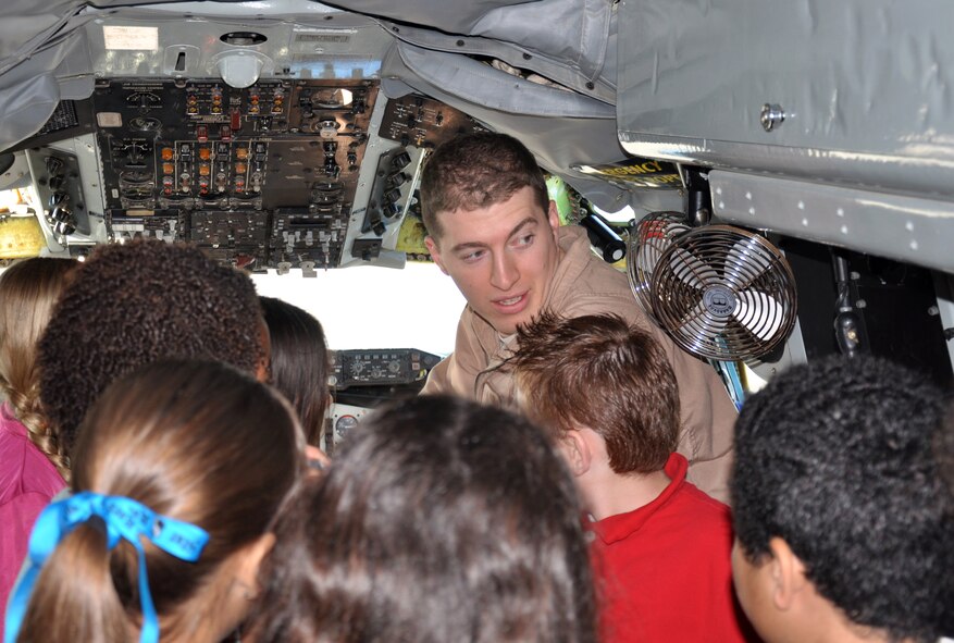 Capt. Justin Skinner, 351st Air Refueling Squadron, gives some local school children a tour of a KC-135 Stratotanker March 18, 2013, at a deployed location in southwest Europe. Skinner is a Choctaw, Okla., native. Airmen and aircraft from the 100th Air Refueling Wing, RAF Mildenhall, England, deployed as the 351st Expeditionary Air Refueling Squadron Jan. 26, 2013. (U.S. Air Force photo by Capt. Jason Smith)