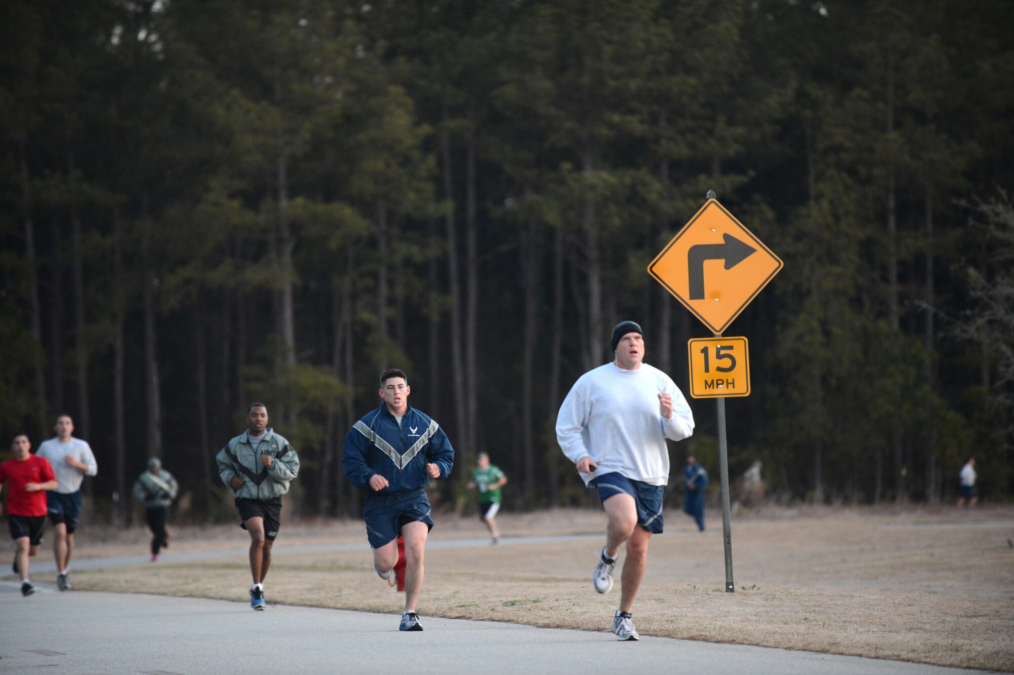 Airmen run during the annual St. Patrick's Day 5km run at Shaw Air Force Base, S.C., March 15, 2013. The 20th Force Support Squadron holds the annual 3-mile run, where service members are encouraged to show their spirit and wear green in celebration of the Irish holiday. More than 250 people attended the race.  (U.S. Air Force photo by Airman 1st Class Nicole Sikorski/Released)