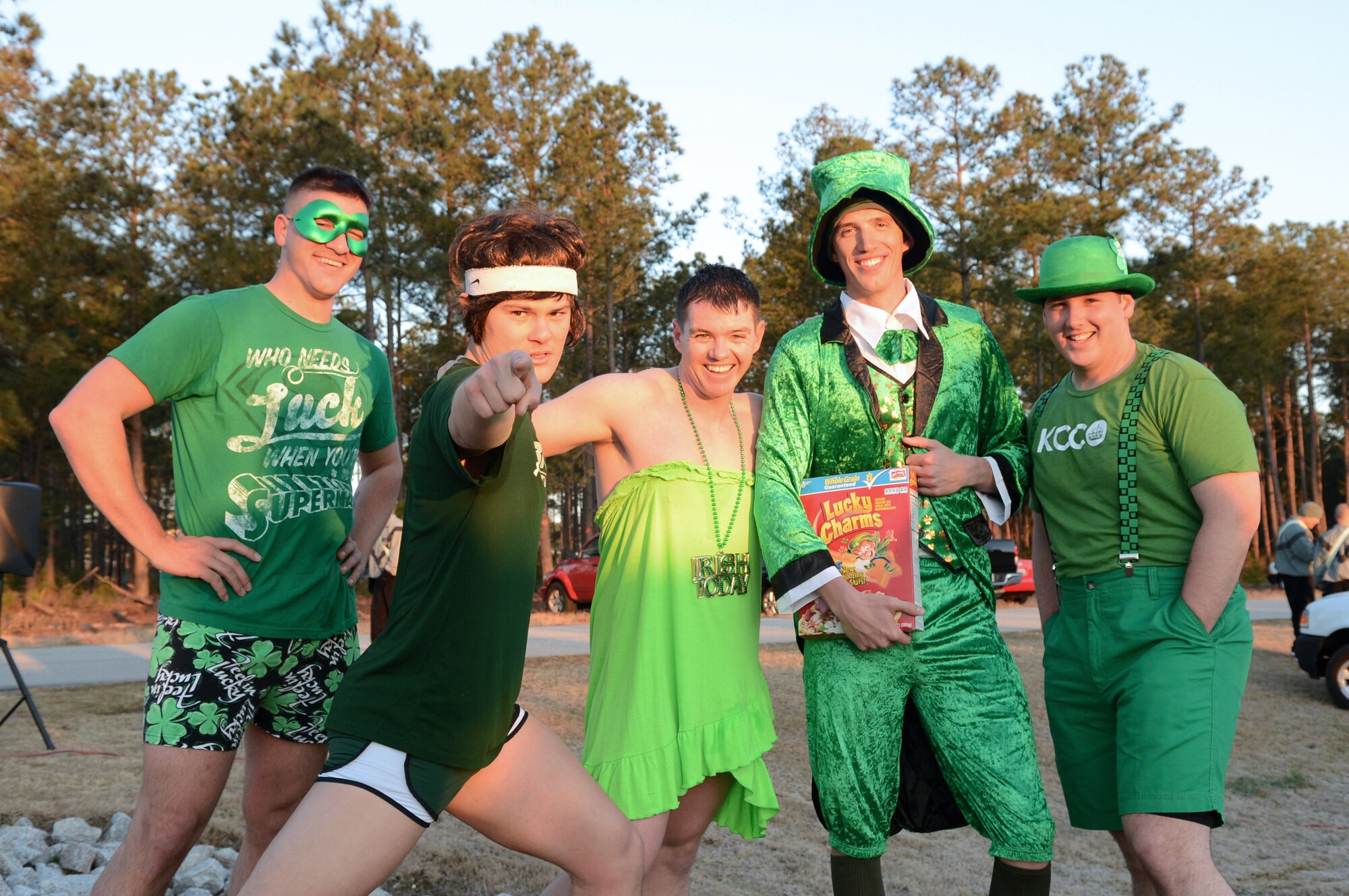 Airmen assigned to the 20th Civil Engineer Squadron, all explosive ordinance technicians, pose for a photo after the St. Patrick's Day 5km run at Shaw Air Force Base, S.C., March 15, 2013.  The 20th Force Support Squadron holds the annual 3-mile run, where service members are encouraged to show their spirit and wear green in celebration of the Irish holiday. More than 250 people attended the race.  (U.S. Air Force photo by Airman 1st Class Nicole Sikorski/Released)