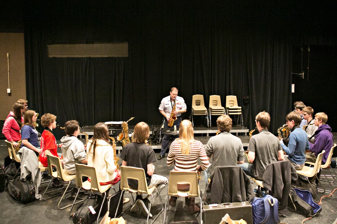 Master Sgt. Josh Fedele, saxophone, gives a master class for high school students in Louisville, Ky.  Band of Flight education outreach concerts provide students a unique opportunity to interact with Wright-Patterson active-duty Airmen. (U.S. Air Force photo)