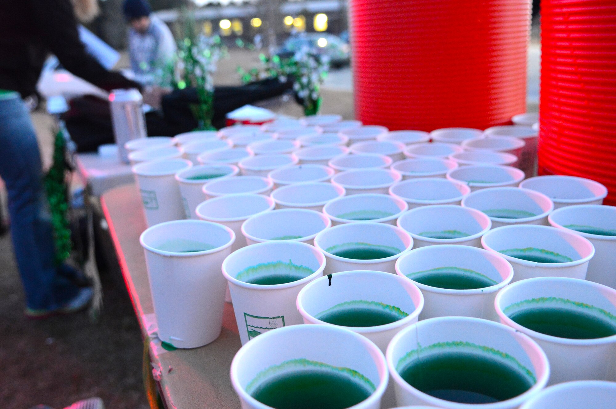 Green sports drink sits on the sign-in table during the St. Patrick's Day 5km run at Shaw Air Force Base, S.C., March 15, 2013.  The 20th Force Support Squadron holds the annual 3-mile run, where service members are encouraged to show their spirit and wear green in celebration of the Irish holiday. More than 250 people attended the race.  (U.S. Air Force photo by Airman 1st Class Nicole Sikorski/Released)
