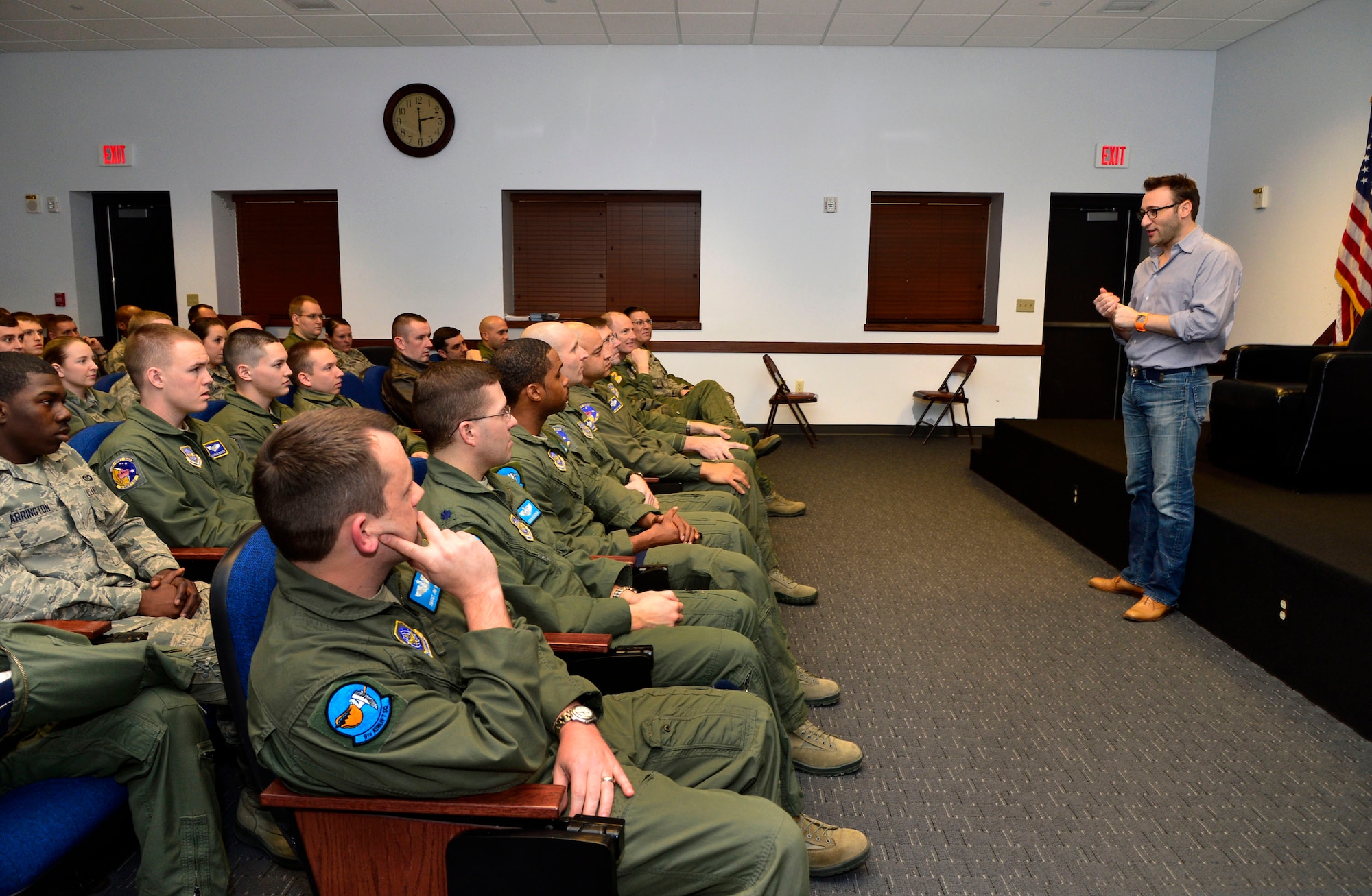 Simon Sinek, motivational speaker, speaks to Airmen from the 9th Airlift Squadron March 14, 2013 at Dover Air Force Base, Del. (US Air Force photo/David S. Tucker)