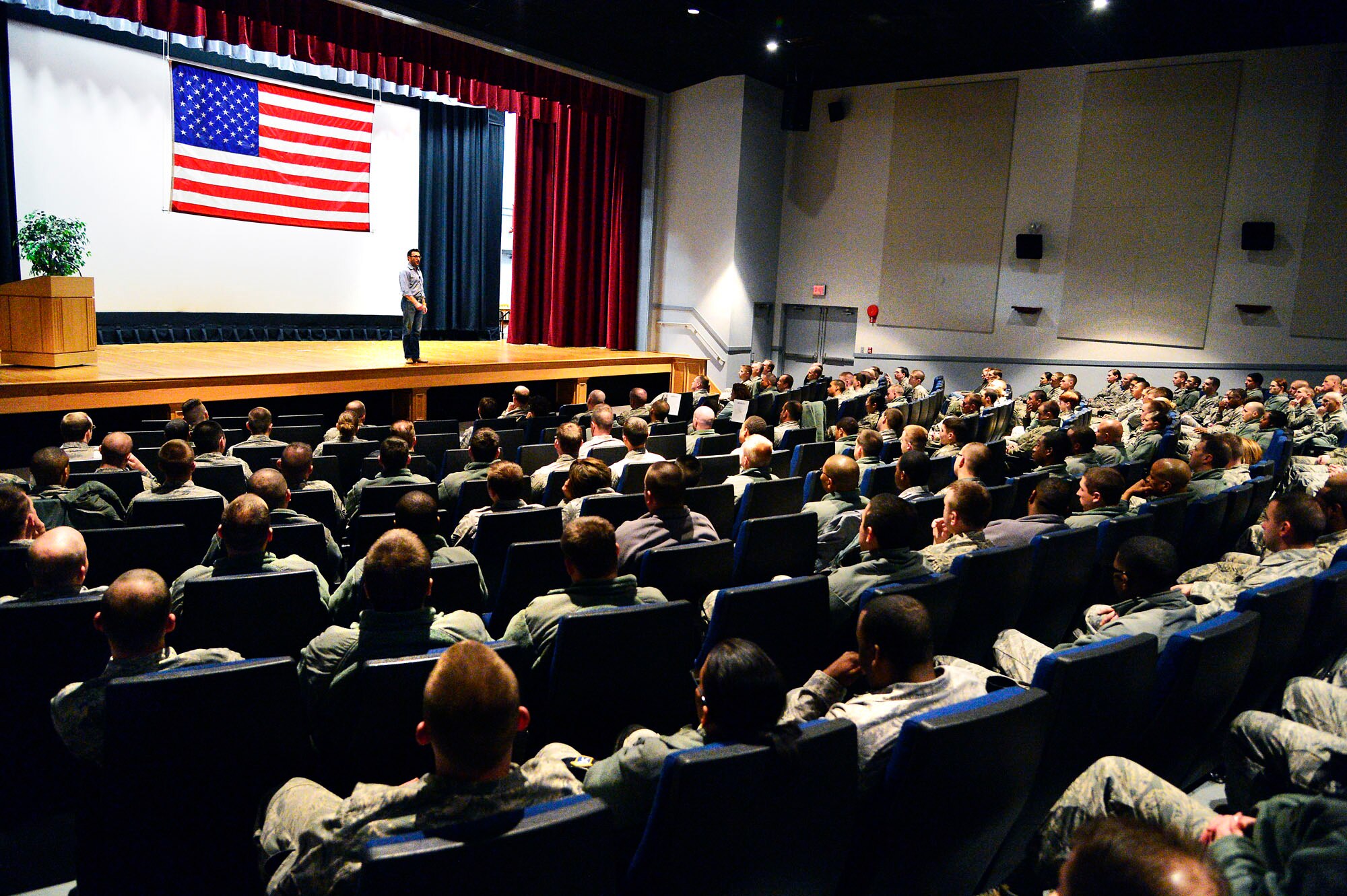 Simon Sinek, motivational speaker, speaks to 436th Airlift Wing Airmen at the base theater March 14, 2013 at Dover Air Force Base, Del. (US Air Force photo/David S. Tucker)