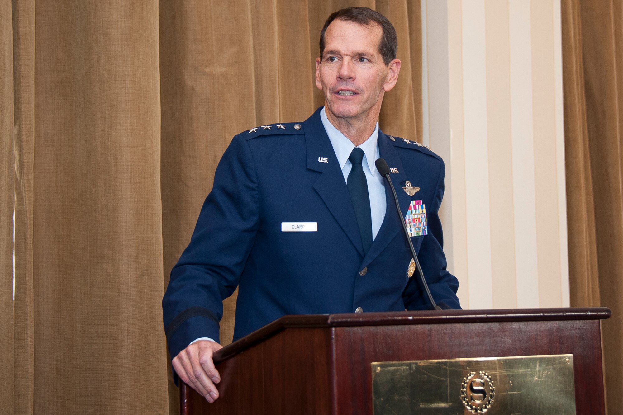 Lt. Gen. Stanley E. Clarke III, director of the Air National Guard, addresses attendees at the
2012 Air Force Association ANG Action Officers of the Year ceremony at the Sheraton National
Harbor Hotel, Arlington, Va. March 13, 2013. The AFA is a non-profit, independent, professional military and aerospace education association which promotes a dominant Air Force and strong national defense and honors Airmen and Air Force heritage. (National Guard photo by Master Sgt. Marvin R. Preston/RELEASED)