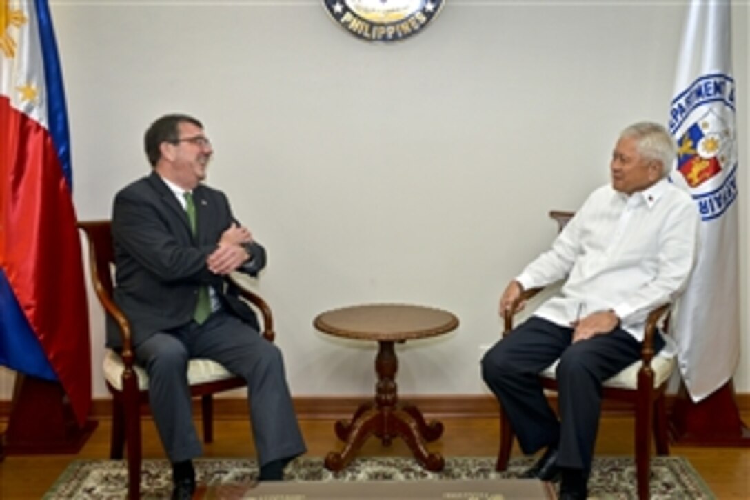 U.S. Deputy Defense Secretary Ash Carter meets with Philippine Foreign Affairs Secretary Albert F. Del Rosario at the Department of Foreign Affairs in Manila, Philippines, March 19, 2013.