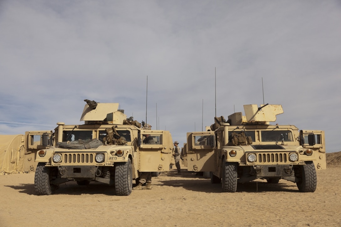 A convoy of Humvees sit ready to depart during Exercise Steel Knight on Marine Corps Air-Ground Combat Center Twentynine Palms, Calif., Nov. 27, 2012. Exercise Steel Knight is an annual training exercise held to demonstrate the 1st Marine Division's abilities in a simulated combat scenario. (U.S. Marine Corps photo by Cpl. Jonathan R. Waldman/Released)