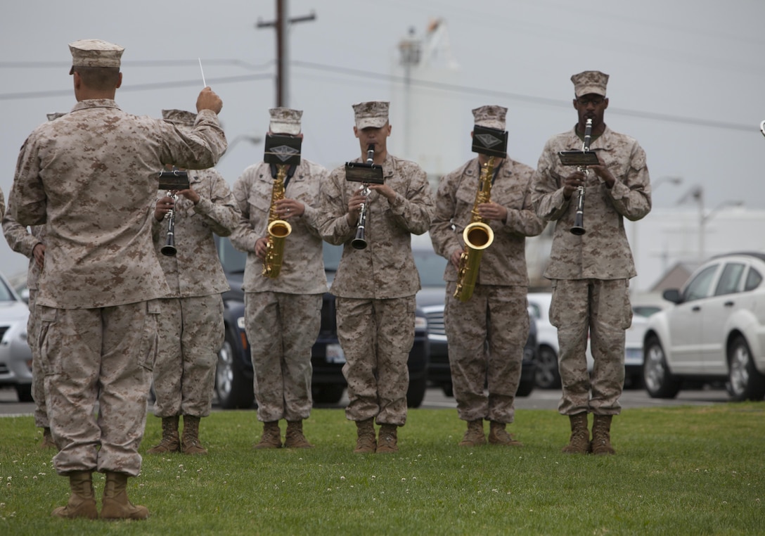 A detail of the 3rd Marine Aircraft Wing Band plays during a morning colors ceremony aboard Marine Corps Air Station Miramar, Calif., March 18. The band is composed of all non-commissioned officers as part of a Committed and Engaged Leadership Initiative.