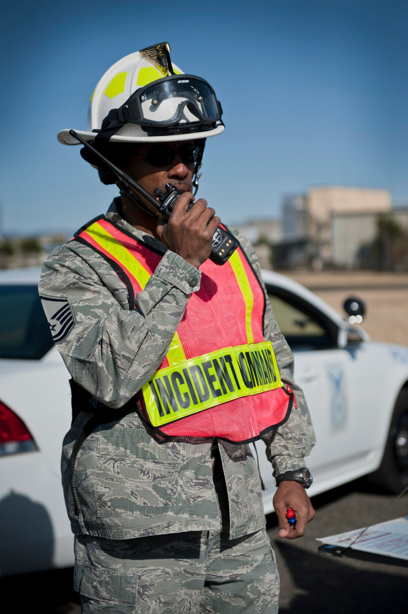 YOKOTA AIR BASE -- MSgt Dion Bullock, 374th Civil Engineering Squadron incident commander, relays information at Yokota Air Base, Japan, March 21, 2013.  One of the many factors to a successful exercise is the quick response of all airman involved. (U.S. Air Force photo by Airman 1st Class Meagan Schutter)