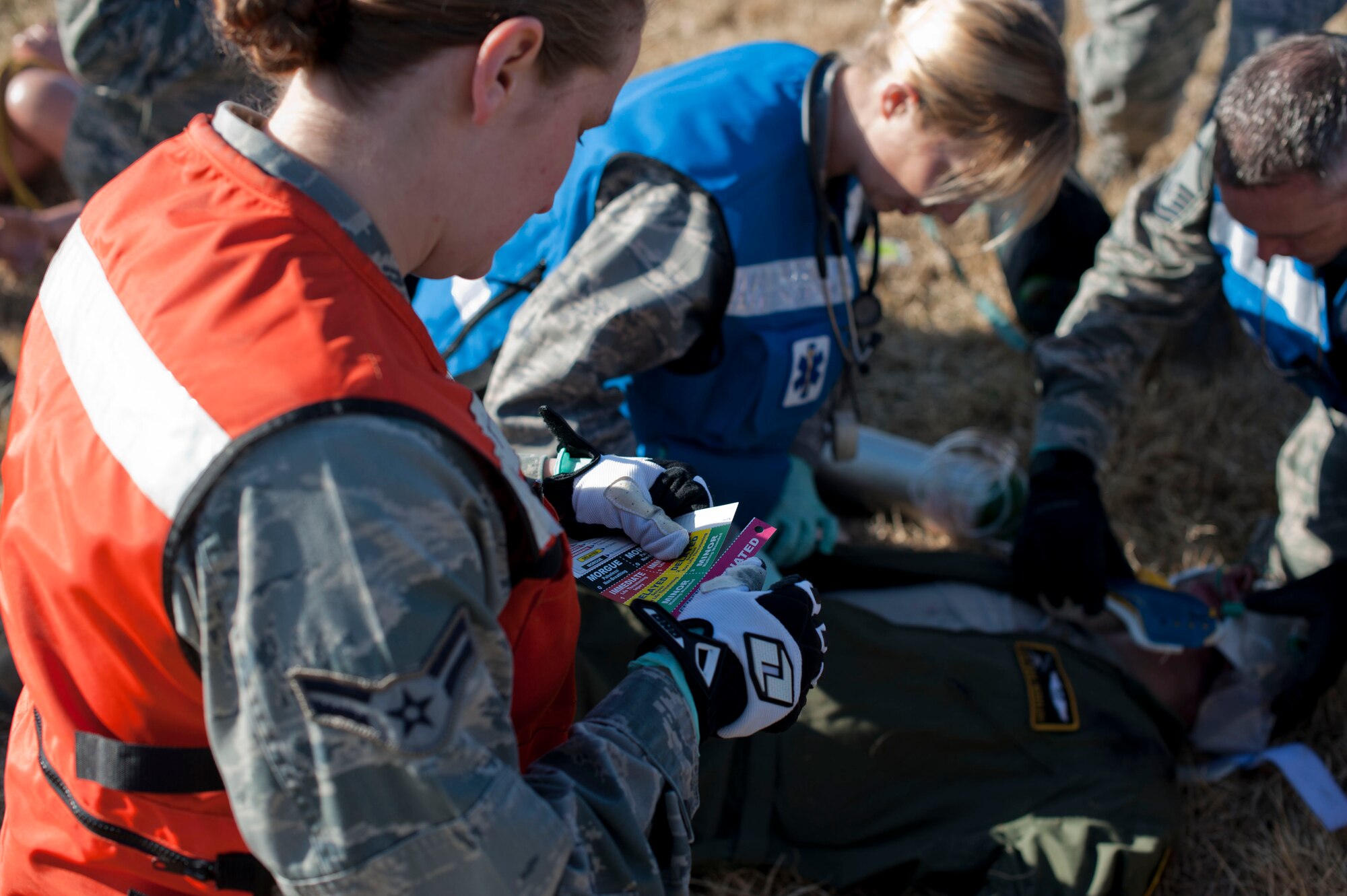 YOKOTA AIR BASE -- Members from the 374th Medical Group attend to a simulated victim, March 21, 2013, at Yokota Air Base, Japan.  In the case of a real-world emergency, exercises prepare Yokota's airman to be ready at a moments notice. (U.S. Air Force photo by Airman 1st Class Meagan Schutter)