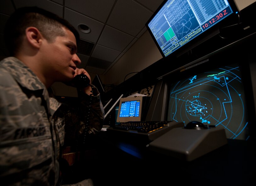 Senior Airman Justin Faircloth, 28th Operations Support Squadron air traffic control technician, monitors airspace during an Operational Readiness Exercise at Ellsworth Air Force Base, S.D., March 20, 2013. The 28th OSS Radar Approach Control section is responsible to direct safe flight patterns for all aircraft flying throughout the region to avoid any possible obstructions and prevent collisions. (U.S. Air Force photo by Airman 1st Class Alystria Maurer/Released)