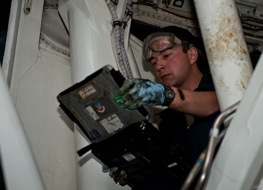 Airman 1st Class Justin Hollis, 28th Aircraft Maintenance Squadron B-1 crew chief, reviews a technical order while performing maintenance on a B-1 during an Operational Readiness Exercise at Ellsworth Air Force, S.D., March 20, 2013. The ORE tests Ellsworth’s ability to deploy and to ensure all Airmen and equipment, are prepared for real-world contingencies. (U.S. Air Force photo by Airman 1st Class Alystria Maurer/Released)