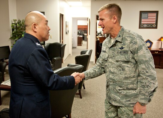 U.S. Air Force Col. Kenneth Ekman, 49th Wing vice commander, welcomes Col. Junichi Kono, 2nd Section Weapons System Program Division chief, to Holloman Air Force Base, N.M., March 19. The remotely piloted aircraft program was briefed to the members of the Japan Air Self Defense Force. Their visit to Holloman AFB was part of an effort to bolster Japanese intelligence, surveillance and reconnaissance capability. (U.S. Air Force photo by Airman 1st Class Colin Cates/Released) 

