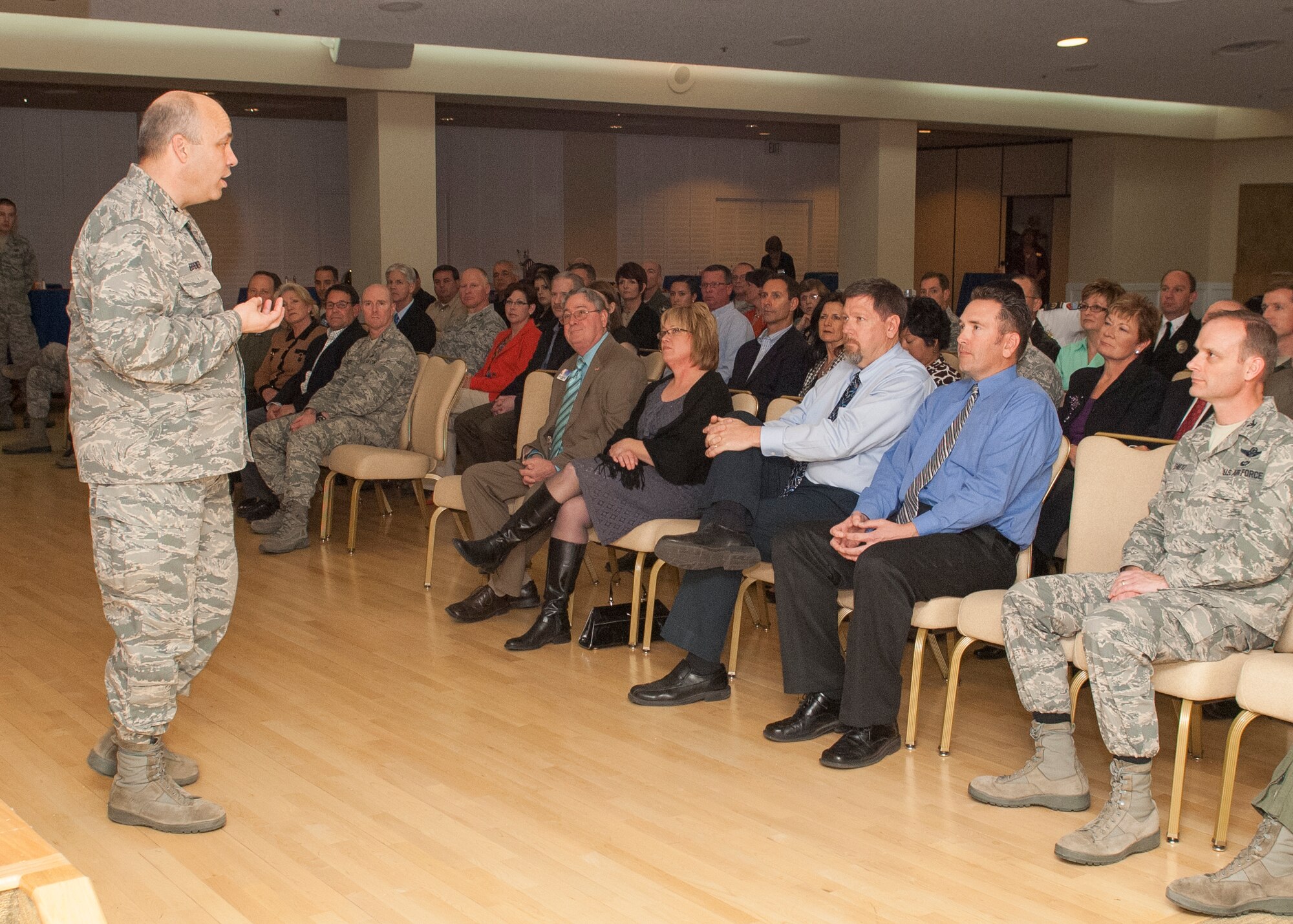 Brig. Gen. Michael T. Brewer, 412th Test Wing commander, welcomed civic leaders from surrounding communities during the Honorary Commanders Program induction ceremony recently held at Club Muroc's Alliance Ballroom. The event introduced honorary commanders to their respective group and squadron commanders. (U.S. Air Force Photo by Edward Cannon)