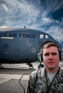 Airman 1st Class Ryan Carroll, 437th Aircraft Maintenance Squadron Aircraft Electronic and Environmental Systems specialist, spends his days on the flight line servicing and preparing C-17 Globemaster IIIs for flight. Carroll prepares for any type of ELEN emergency because on the flight line, “anything is possible.” (U.S. Air Force photo / Airman 1st Class Tom Brading)