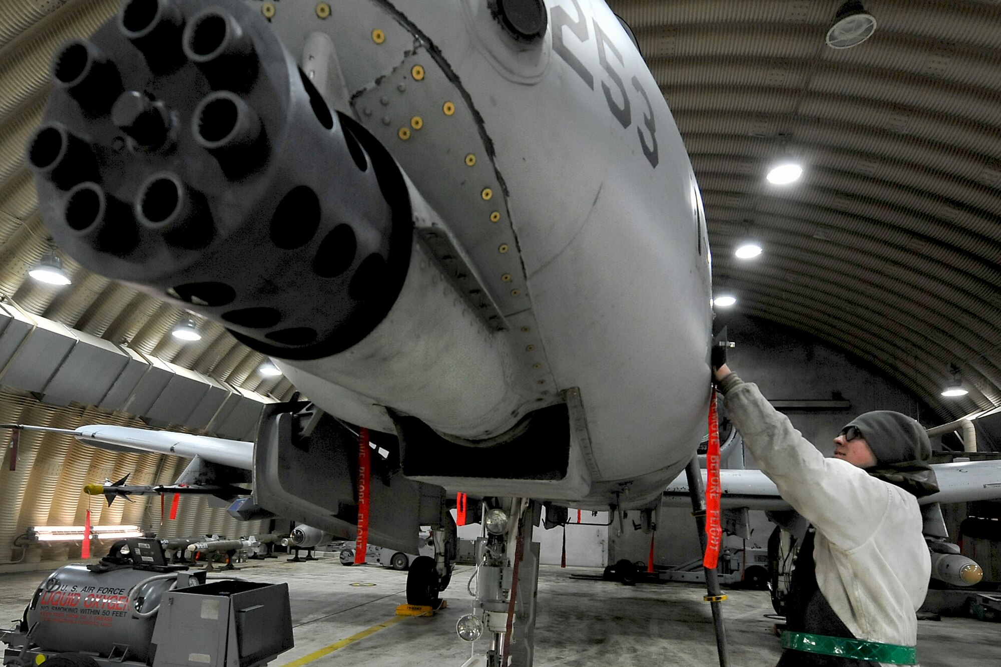 Senior Airman Ryan Holovich, 25th Aircraft Maintenance Unit crew chief, services liquid oxygen on an A-10 Thunderbolt II, during an Operation Readiness Exercise Beverly Midnight 13-02 at Osan Air Base, Republic of Korea, March 21, 2013. Airmen with the 25th AMU and all over the base are  constantly working  24/7 throughout the week-long exercise in all types of weather conditions. These types of exercises test Osan Airmen’s abilities during a heightened state of readiness while providing combat ready forces for close air support, air strike control, forward air control-airborne, combat search and rescue, counter air and fire, and interdiction in the defense of the Republic of Korea. (U.S. Air Force photo/Staff Sgt. Sara Csurilla)