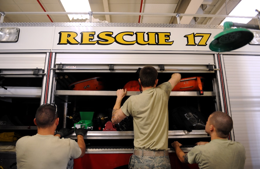 Airmen from the 2nd Logistics Readiness Squadron Firetruck and Refueling Maintenance Section inspect a compartment of a rescue truck on Barksdale Air Force Base, La., March 20. Because of their importance to the mission, firetrucks require maintenance from Airmen who specialize in maintaining them. (U.S. Air Force photo/Airman 1st Class Benjamin Gonsier)