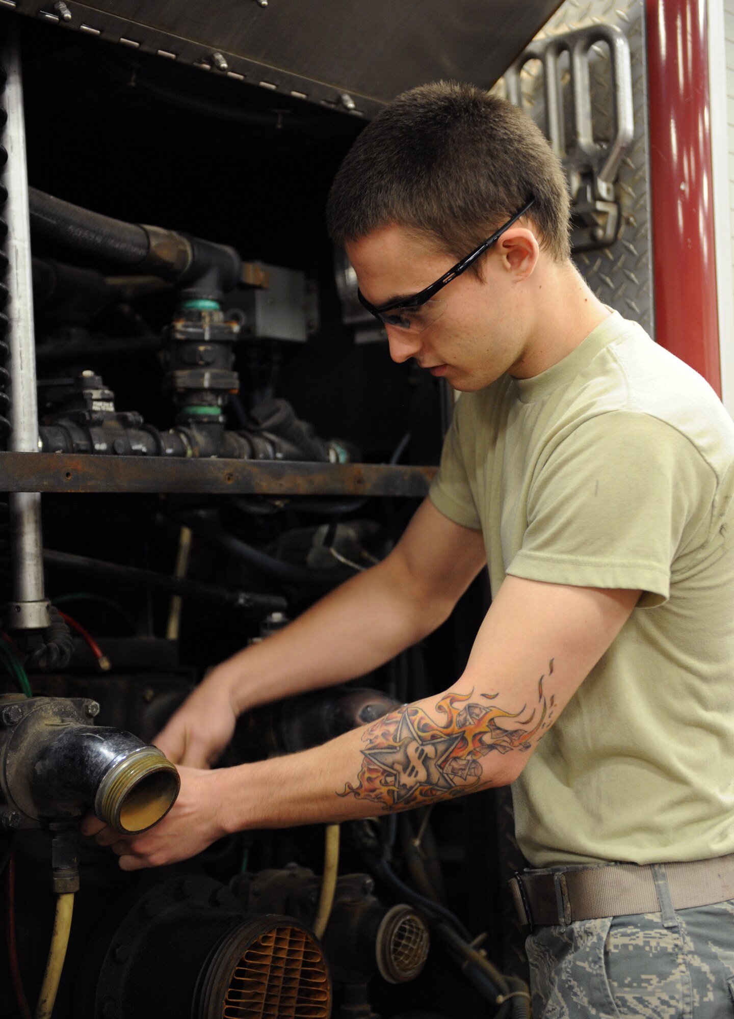 Airman 1st Class Timothy Bailey, 2nd Logistics Readiness Squadron Firetruck and Refueling Maintenance Section, tightens a bolt on a P-22 firetruck on Barksdale Air Force Base, La., March 20. Fire and refueling trucks have unique systems, which require Airmen to have in-depth knowledge on how to maintain them. (U.S. Air Force photo/Airman 1st Class Benjamin Gonsier)