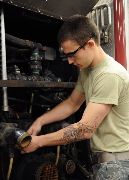 Airman 1st Class Timothy Bailey, 2nd Logistics Readiness Squadron Firetruck and Refueling Maintenance Section, tightens a bolt on a P-22 firetruck on Barksdale Air Force Base, La., March 20. Fire and refueling trucks have unique systems, which require Airmen to have in-depth knowledge on how to maintain them. (U.S. Air Force photo/Airman 1st Class Benjamin Gonsier)