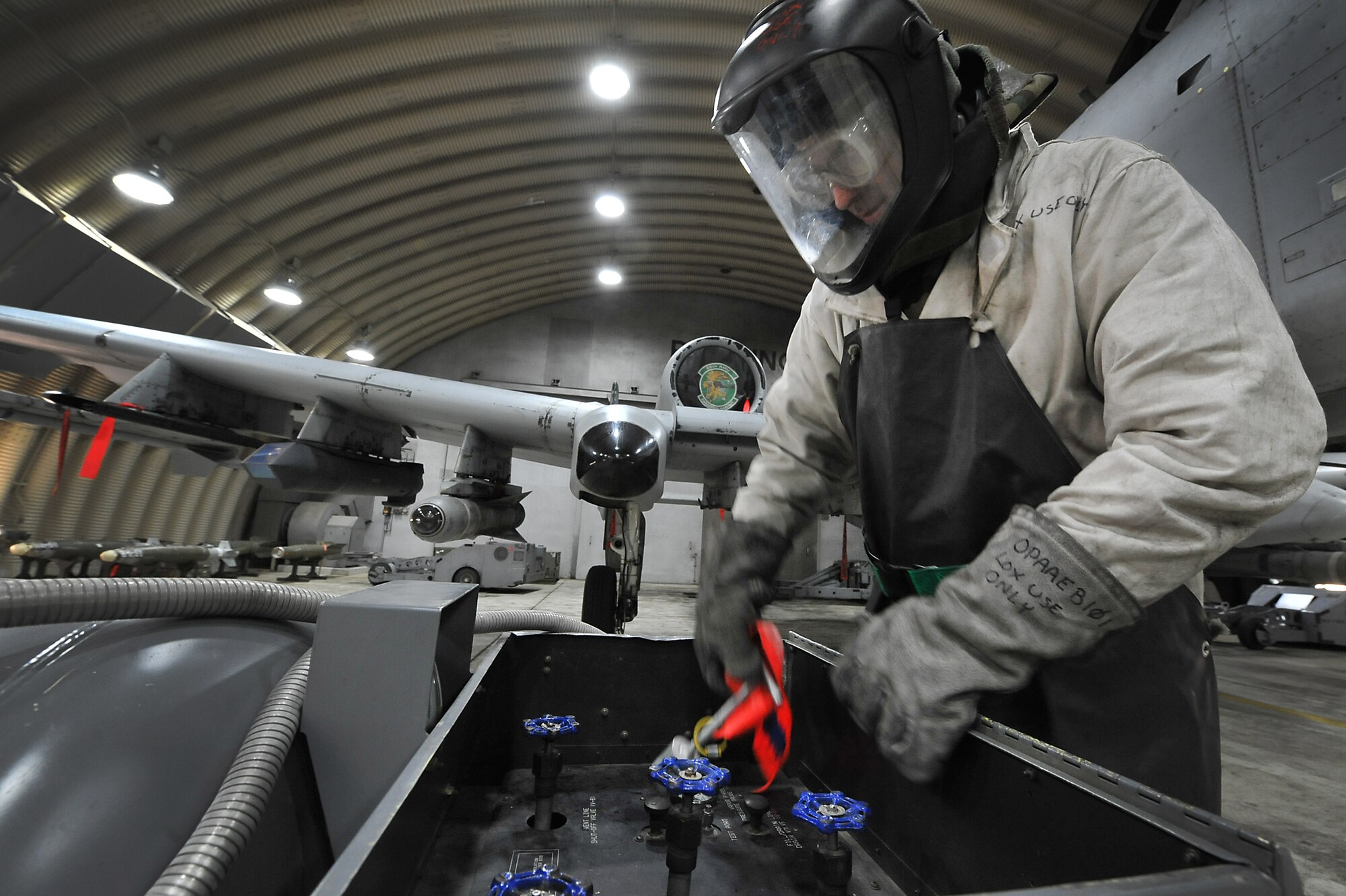 Senior Airman Ryan Holovich, 25th Aircraft Maintenance Unit crew chief, services liquid oxygen on an A-10 Thunderbolt II, during an Operation Readiness Exercise Beverly Midnight 13-02 at Osan Air Base, Republic of Korea, March 21, 2013. Airmen with the 25th AMU and all over the base are  constantly working  24/7 throughout the week-long exercise in all types of weather conditions. These types of exercises test Osan Airmen’s abilities during a heightened state of readiness while providing combat ready forces for close air support, air strike control, forward air control-airborne, combat search and rescue, counter air and fire, and interdiction in the defense of the Republic of Korea. (U.S. Air Force photo/Staff Sgt. Sara Csurilla)