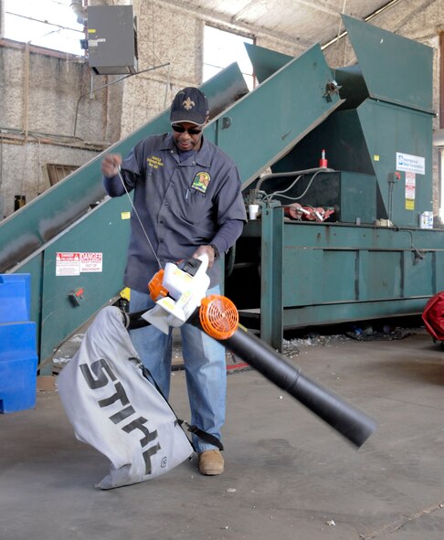 Harold Player, 2nd Force Support Squadron Equipment Rental, starts a shredder vac on Barksdale Air Force Base, La., March 20. Player used the shredder vac to clean leaves and debris from a bouncy pit during routine cleaning and maintenance of the facility's equipment. (U.S. Air Force photo/Airman 1st Class Andrew Moua)