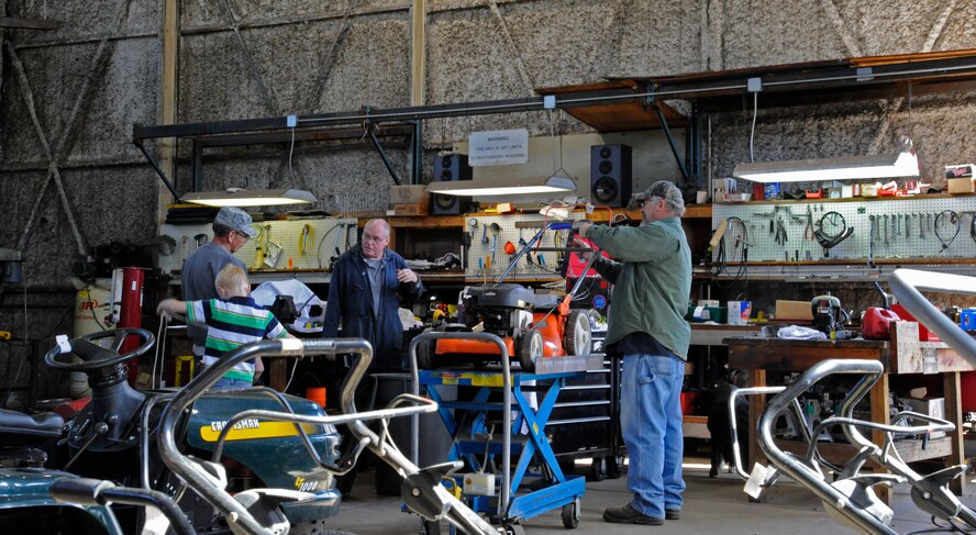 Workers assigned to the 2nd Force Support Squadron Equipment Rental repair equipment on Barksdale Air Force Base, La., March 20. Equipment Rental lends out and maintains equipment for Team Barksdale to use ranging from campers, grills, boats and trailers as well as offering lawn mower repair. (U.S. Air Force photo/Airman 1st Class Andrew Moua)