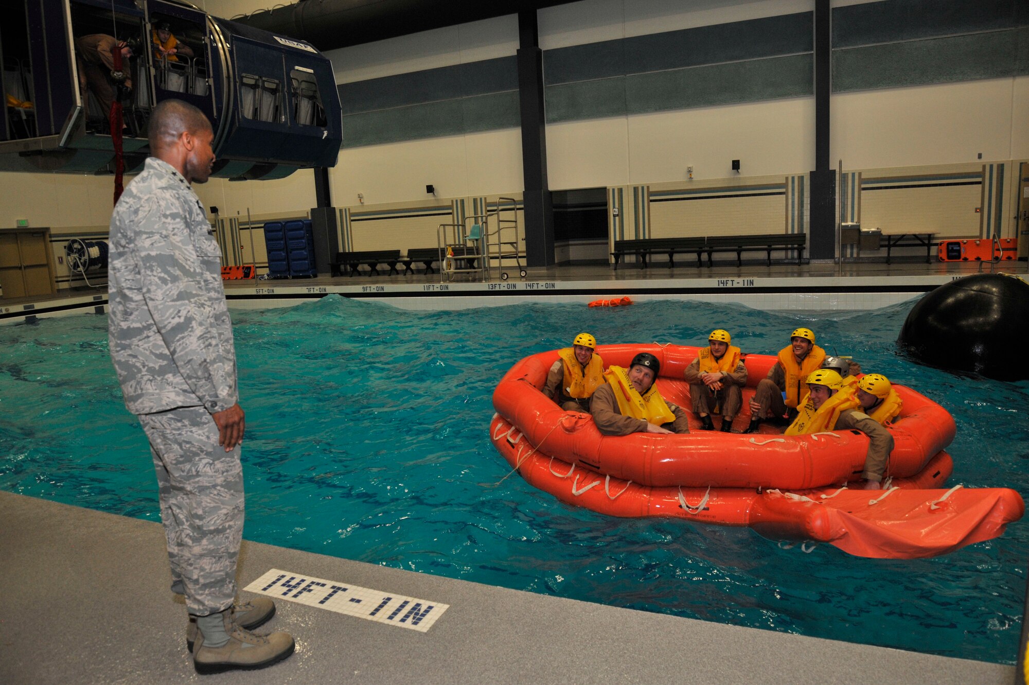 Lt. Gen. Darren McDew, 18th Air Force commander, thanks volunteers for demonstrating training procedures in the fitness center at Fairchild Air Force Base, Wash., March 13, 2013. McDew thanked Airmen for their continued excellence during a three-day visit. (U.S. Air Force photo by Airman 1st Class Janelle Patiño)

