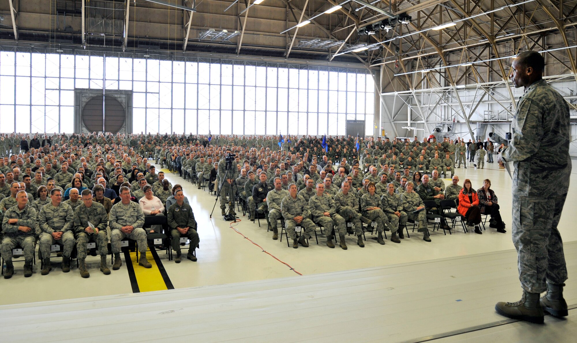 Lt. Gen. Darren McDew, 18th Air Force commander, speaks with members of Team Fairchild during an all-call at Fairchild Air Force Base, Wash., March 13, 2013. Airmen asked the general questions on topics ranging from sequestration to the recent suspension of tuition assistance. (U.S. Air Force photo by Airman 1st Class Janelle Patiño)