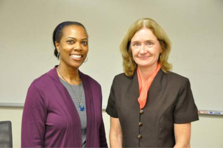 Cathy Jerrard, right, is the new base environmental coordinator at the former Williams Air Force Base. Ms. Jerrard is taking over for former BEC Michelle Lewis, left. (Photo by Scott Johnston) 
