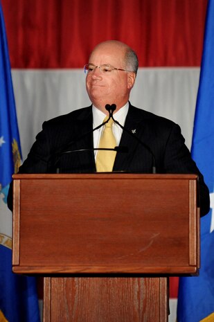 Orlando Carvalho, Lockheed Martin Aeronautics executive vice president and general manager of the F-35 program, speaks during the F-35A Lightning II arrival ceremony March 19, 2013, in the Thunderbird Hangar at Nellis Air Force Base, Nev. In his position as program manager, Carvalho was responsible for the successful completion of the system development and demonstration program, production, flight testing, global deployment and sustainment of the three F-35 variants for 13 military services in nine partner countries and two foreign military sales customers. (U.S. Air Force photo by Staff Sgt. William P. Coleman)