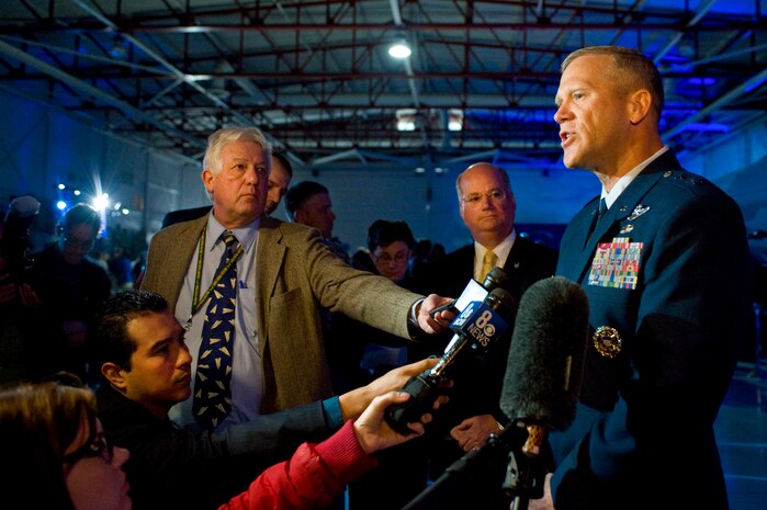 U.S. Air Force Maj. Gen. Jeffrey Lofgren, U.S. Air Force Warfare Center commander, and Orlando Carvalho Lockheed Martin Aeronautics executive vice president and general manager of the F-35 program, answers questions from media during the F-35A Lightning II arrival ceremony March 19, 2013, in the Thunderbird Hangar at Nellis Air Force Base, Nev. The F-35A Lightning II is assigned to the 422nd Test and Evaluation Squadron and its modern engine delivers more than 60 percent more thrust than other aircraft of the same weight. (U.S. Air Force photo by Airman 1st Class Christopher Tam)