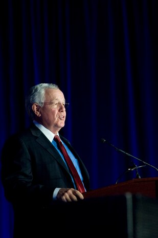 Randy Black, U.S. Air Force Warfare Center honorary commander, speaks to military members and civilians during the F-35A Lightning II arrival ceremony March 19, 2013, in the Thunderbird Hangar at Nellis Air Force Base, Nev. Black is a Las Vegas native and heads the Nellis Support Team. (U.S. Air Force photo by Airman 1st Class Christopher Tam)