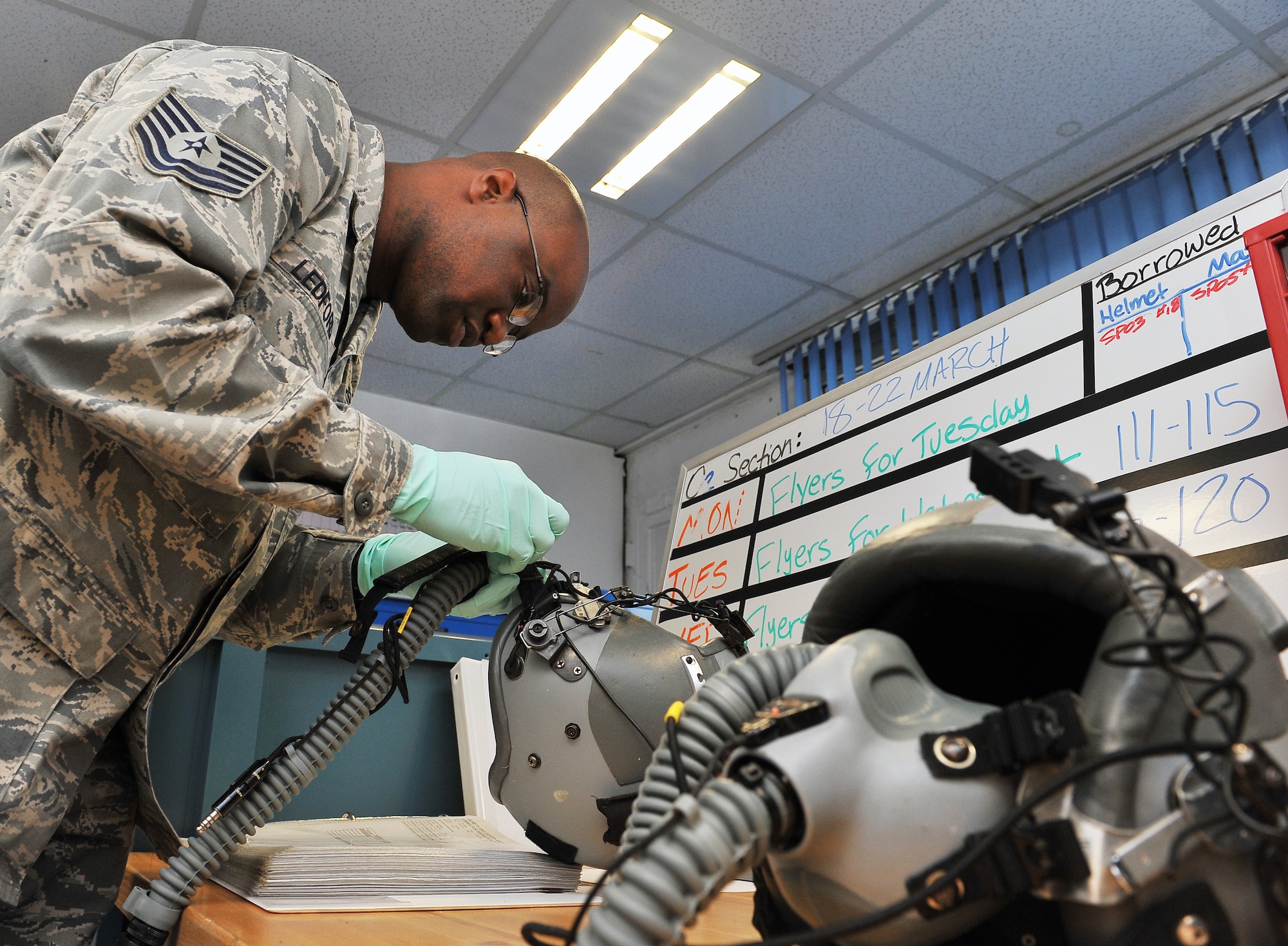 Tech. Sgt. Timothy Ledford, 86th Operations Support Squadron aircrew flight equipment craftsman, checks for defects on an oxygen masks, March 20, 2013, Ramstein Air Base, Germany. Ledford was honored with the aircrew flight equipment NCO of the year award for his outstanding accomplishments. (U.S. Air Force photo/Airman 1st Class Dymekre Allen)
