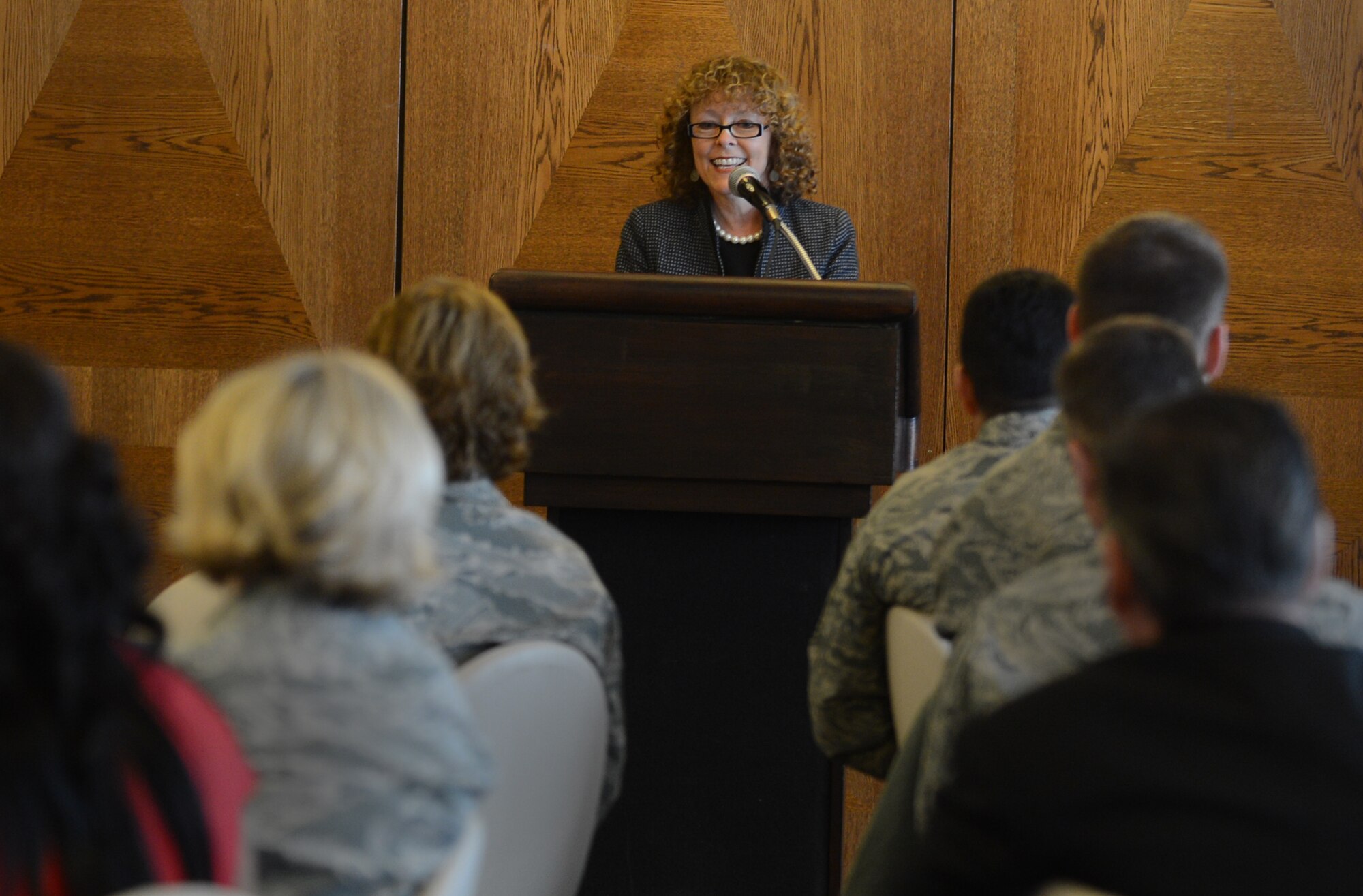 Dr. Dell W. McMullen, Kaiserslautern district superintendent, speaks to Airman during the Kaiserslautern Military Community Woman’s History Month luncheon on Ramstein Air Base, Germany, March 19, 2013. Ever since 1987, the month of March has been set aside to recognize and celebrate the multi-cultural history of American women in schools, work places and communities throughout the country. The theme of the luncheon was celebrating women in science, technology, engineering and mathematics. (U.S. Air Force photo/ Senior Airman Caitlin O’Neil-McKeown)