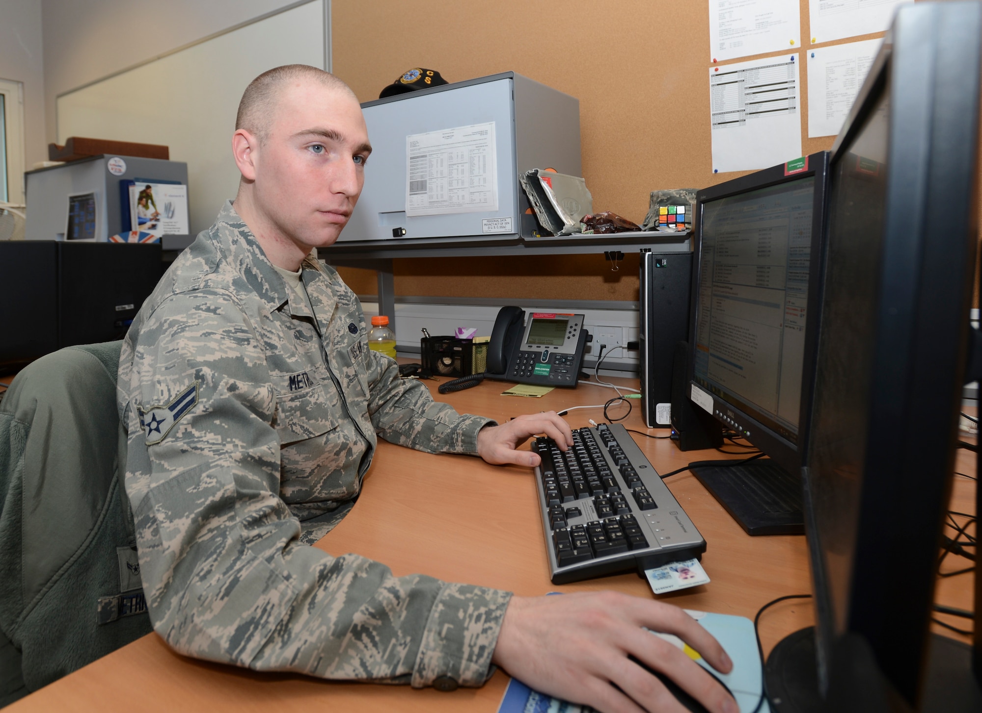 ROYAL AIR FORCE LAKENHEATH, England - Airman 1st Class Brandon Metrick, 48th Communications Squadron cyber surety technician, performs cyber surety operations March 20, 2013. Metrick hails from Highlands, N.C. (U.S. Air Force photo by Staff Sgt. Stephen Linch)