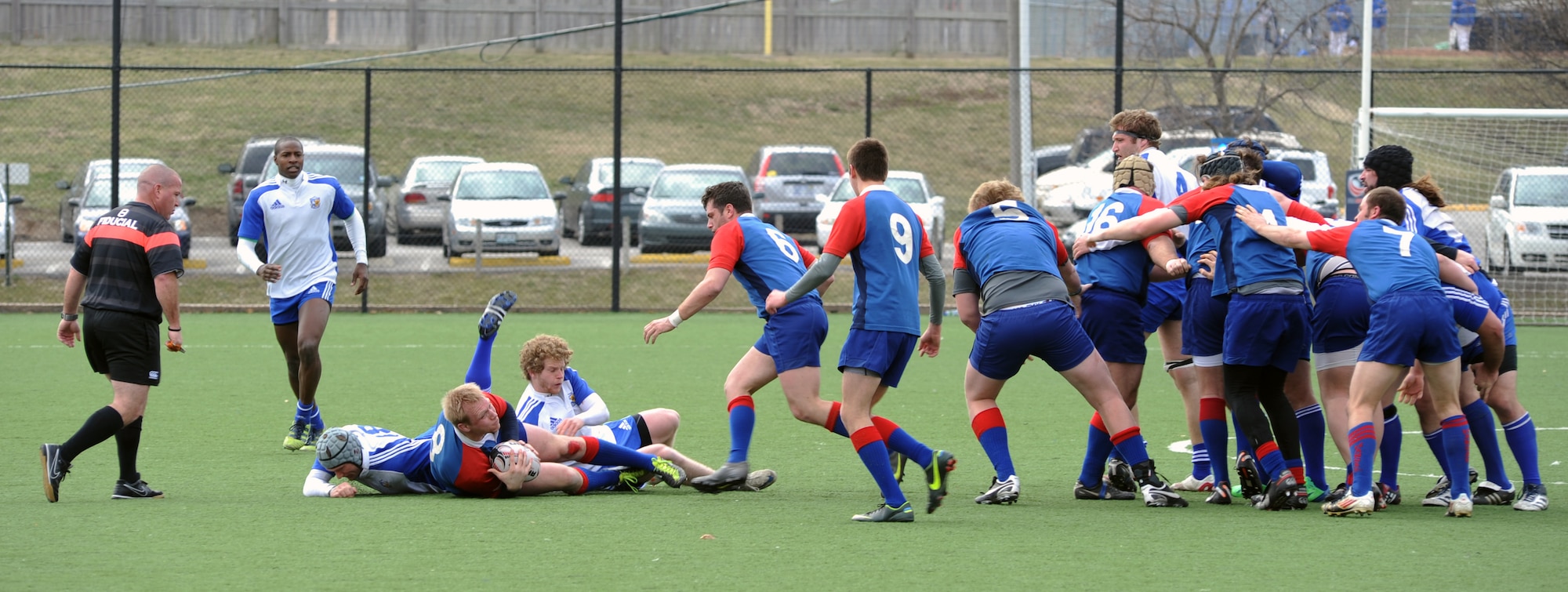 Chuck Henson, Kansas City Blues Rugby Club player, yells encouragement to his teammates before a game in Kansas City, Mo., March 16, 2013. During rugby matches, shouted expletives and bloody injuries are par for the course. (U.S. Air Force photo by Senior Airman Brigitte N. Brantley/Released)