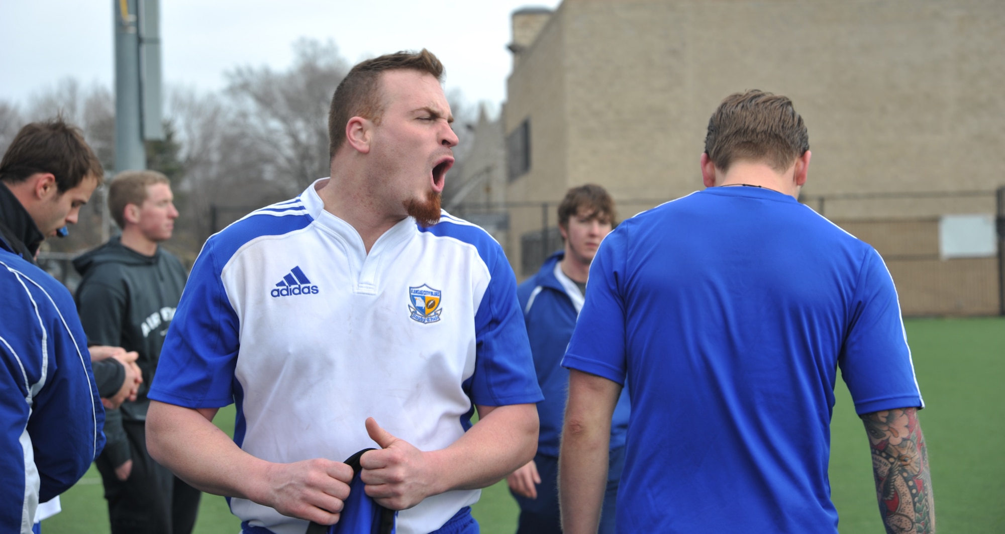 Chuck Henson, Kansas City Blues Rugby Club player, yells encouragement to his teammates before a game in Kansas City, Mo., March 16, 2013. During rugby matches, shouted expletives and bloody injuries are par for the course. (U.S. Air Force photo by Senior Airman Brigitte N. Brantley/Released)