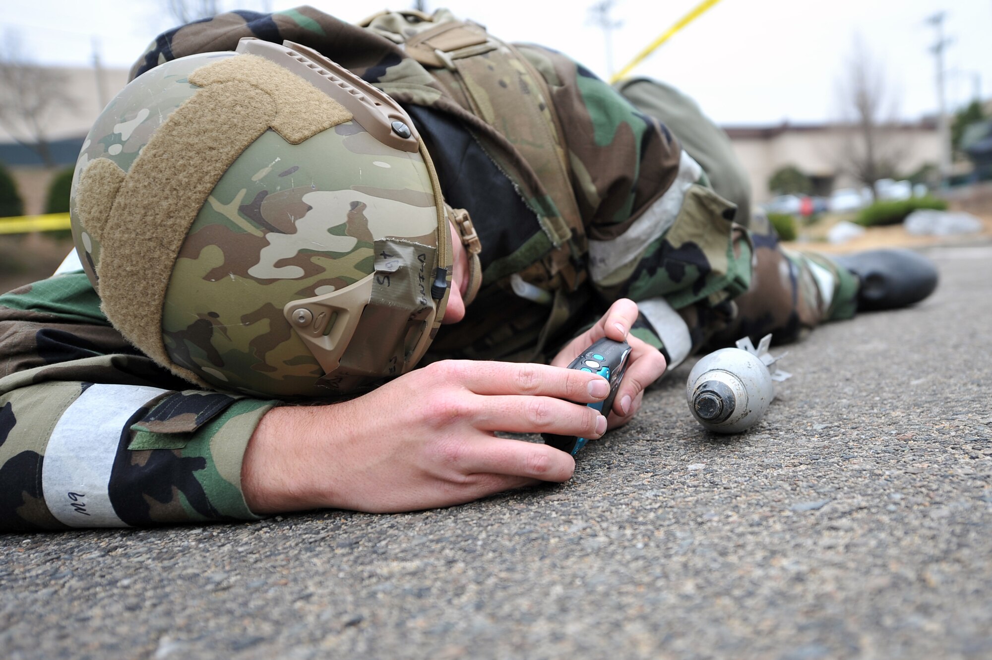A 51st Civil Engineer Squadron Explosive Ordnance Disposal craftsman, takes photos of a mortar to identify it during Operational Readiness Exercise Beverly Midnight 13-02 outside Bldg. 839 at Osan Air Base, Republic of Korea, March 20, 2013. This is Osan's third simulated wartime contingency exercise in 2013 that will test the base’s ability to defend and execute the mission in a heightened state of readiness.  
(U.S. Air Force photo/Senior Airman Alexis Siekert)