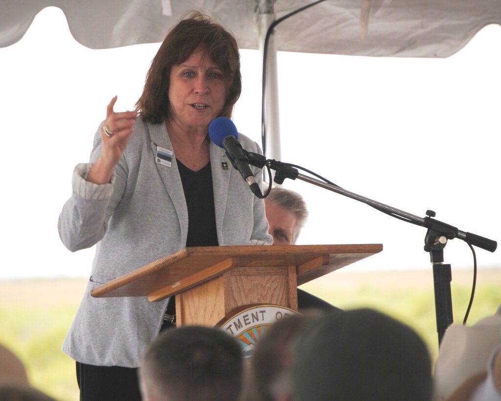 Assistant Secretary of the Army for Civil Works Jo-Ellen Darcy spoke at the Tamiami Trail One-Mile Bridge Opening Ceremony March 19, 2013, in Miami, Fla., alongside Secretary of the Interior Ken Salazar, Everglades National Park Superintendent Dan Kimball, and South Florida National Parks Trust Board Chairman Neal McAliley. 