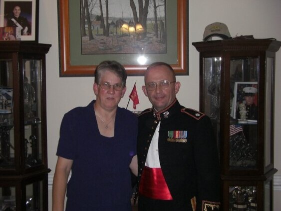 Sandy L. Lawrence and her husband, Lt. Col. Roy E. Lawrence, prepare for the 2008 Marine Corps Birthday Ball at their home at Cherry Point, N.C. In 1975, the Marine Corps opened all military occupational specialties to women except for those whose mission it is to engage in direct combat. Two years later, Sandy became the first female aviation mechanic at Marine Corps Air Station Yuma, Ariz. 