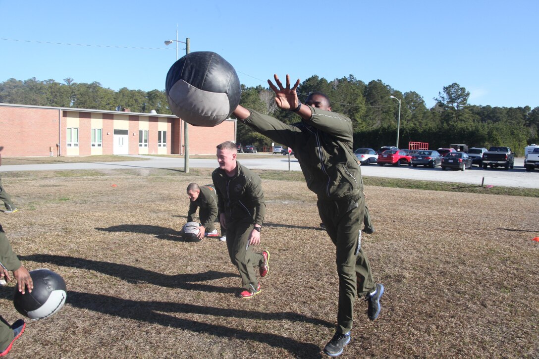 Marines with Marine Air Control Squadron 2 participate in a squadron-wide High Intensity Tactical Training class here March 15.