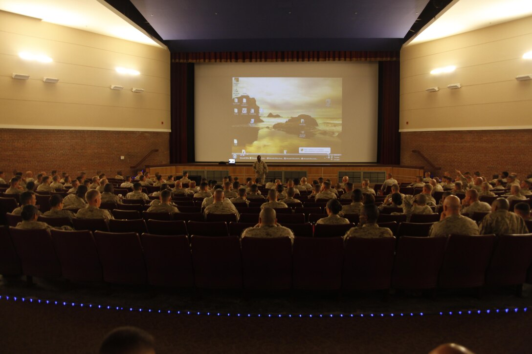 Cherry Point staff noncommissioned officers listen to Sgt. Maj. Michael Jones, U.S. Marine Corps Forces Command, speak about sequestration, sexual assault, leadership and numerous other topics March 14 at the station theater.