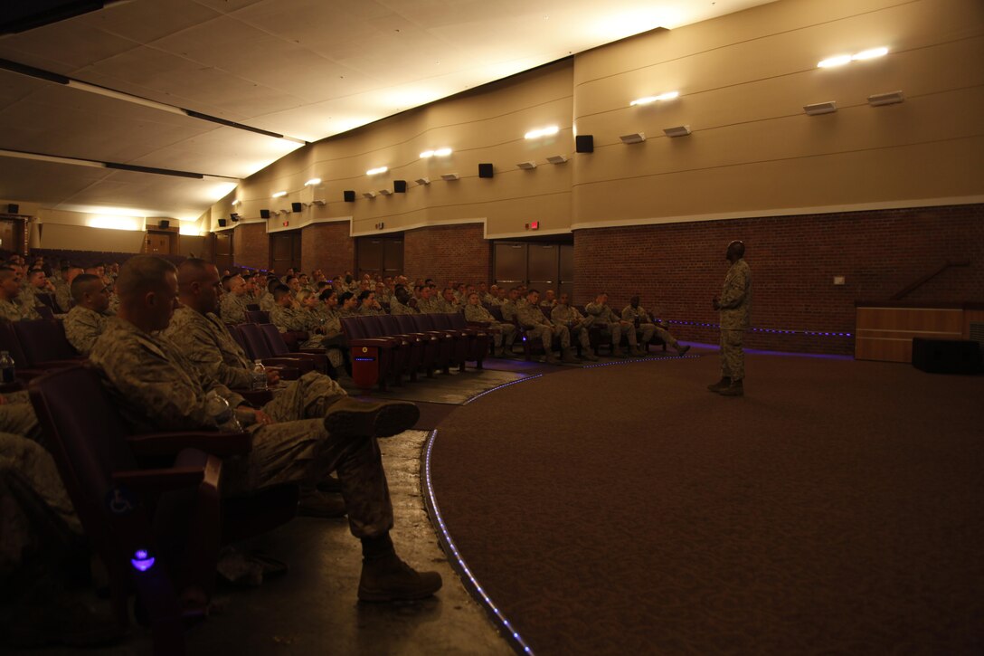 Cherry Point staff noncommissioned officers listen to Sgt. Maj. Michael Jones, U.S. Marine Corps Forces Command, speak about sequestration, sexual assault, leadership and numerous other topics March 14 at the station theater.