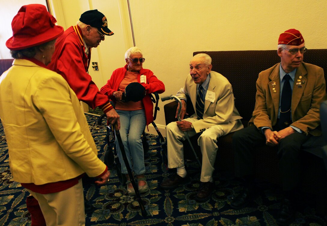 World War II veterans mingle at the 68th Anniversary of the Battle of Iwo Jima luncheon ceremony at the Marines' Memorial Club and Hotel March 13, 2013. The event was an opportunity to accentuate the connection between the WWII-era 4th Marine Division with today's 4th Marine Division and Marine Forces Reserve. More than 100 veterans, modern Marines and guests were in attendance. 
